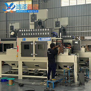 输送式自动喷砂机24只枪往返双向自动喷砂机